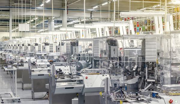 Production machines installed at an industrial enterprise, the production of cables for the automotive industry. Modern equipment.